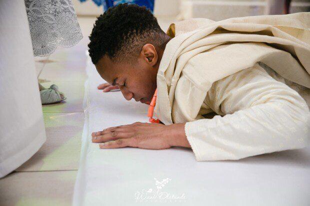 Checklist for Yoruba Traditional Wedding - prostration of groom in a Yoruba traditional wedding