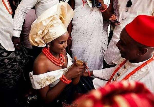 Palm wine offering to groom at Igbo traditional wedding ceremony